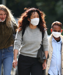 Sandra Oh - Spotted filming 'Killing Eve' in a London Park, August 23, 2021