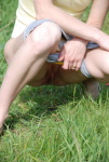 DirtyPublicNudity Cutie waters the grass with her hot urine