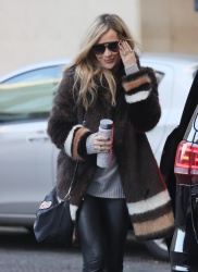 Laura Whitmore - Looks chic in a fluffy coat leather trousers and boots arriving at the BBC studios in London, November 28, 2021