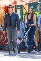 Joe Jonas & Sophie Turner - go for a weekend stroll with their baby in New York, 09/25/2021