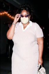 Lizzo - Flaunts her curves in a pink and white striped dress while leaving dinner at Crossroads Kitchen in Los Angeles, April 13, 2021