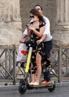 Lily James - Hops on an electric scooter to go sightseeing in Rome October 11, 2020