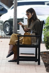 Jordana Brewster - chats on her phone while eating a light lunch while Christmas shopping in Pacific Palisades, California | 12/11/2020