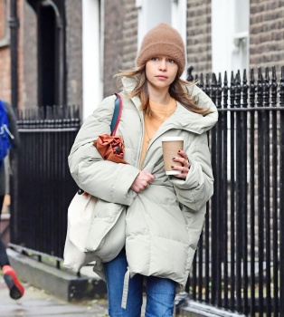 Emilia Clarke - Wraps up warm in an oversized puffer jacket and beanie hat as she's pictured running errands in London, October 25, 2020