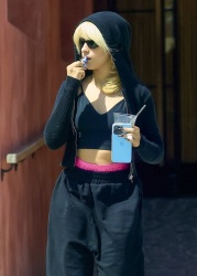 Camila Cabello - Refreshes her lip gloss after dining at The Great White, Los Angeles CA - April 24, 2024
