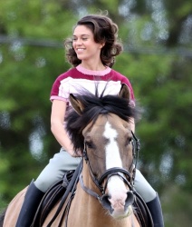 Sabrina Bartlett - Seen riding a horse whilst filming new ITV drama 'The Larkins' in London, May 12, 2021