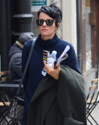 Lily Allen - Spotted out while lighting up a cigarette in London’s west end, October 13, 2021