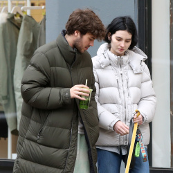 Meadow Walker - Share a cuddly moment with her husband Louis Thornton-Allan and their dog after stopping for coffee in Soho, December 28, 2021