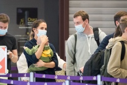 Alicia Vikander & Michael Fassbender - Spotted with their newborn at Paris-Charles de Gaulle airport in Paris, August 5, 2021