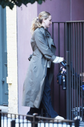 Jennifer Lawrence - Sporting a grey trench coat for an autumn walk, New York City - October 16, 2023