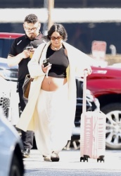 Vanessa Hudgens - Flying for two, catches a post-Oscars flight out of town, Los Angeles CA - March 11, 2024