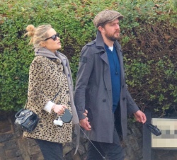 Laura Whitmore - Takes a romantic walk hand-in-hand with new husband Iain Stirling in London, January 17, 2021