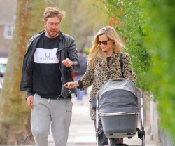 Laura Whitmore - Out for a walk with boyfriend Iain Sterling and their newborn baby in London, April 12, 2021