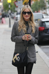 Laura Whitmore -Looks chic making a leggy appearance wearing a patterned print short dress and grey blazer at BBC Radio 5 in London, November 14, 2021