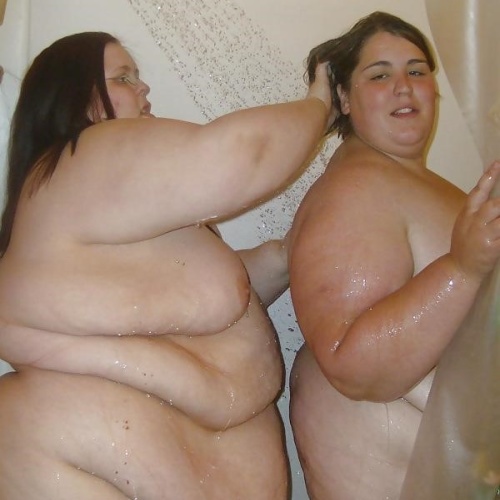 Girls showering together nude