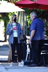 Laura Dern - Looks stylish while out for lunch with her family in Brentwood, October 27, 2021