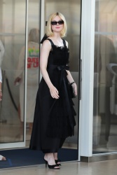 Elle Fanning - Leaving The Hotel Martinez in Cannes France 05/24/2024