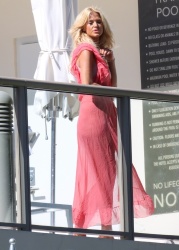 Victoria Silvstedt - seen doing a photoshoot on her hotel balcony during her stay in Miami, Florida | 01/26/2021