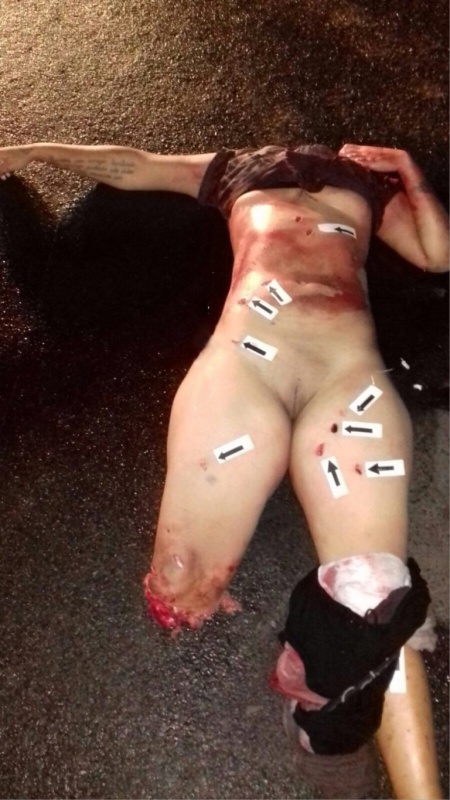 Nude woman beheaded and chopped. 