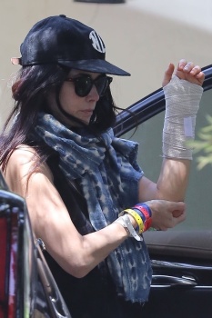 Abigail Spencer - Looks frail and in pain while being helped out of her car with hospital wrist bands on her right hand in Los Angeles, May 1, 2020