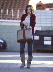 Milla Jovovich - Spotted out with family in Los Angeles, January 12, 2022