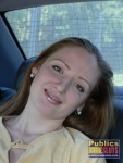 Pretty redhead Afina putting on leg warmers in the car  DirtyPublicNudity 