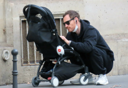 Michael Fassbender - Is a doting dad as he goes for a walk with his new born baby in Paris, August 17, 2021