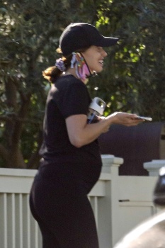 Katherine Schwarzenegger - Stop to chat with a neighbor as she takes a walk in the morning for her daily exercise in Santa Monica, May 19, 2020
