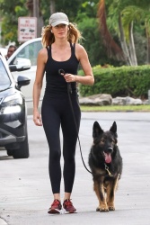 Gisele Bundchen - Out walking her dog in Miami FL 04/30/2024