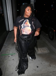 Lizzo - Wears a T-shirt that read 'Lizzo Rumors Enuff to Feed the Needy' while out for dinner at Catch LA in West Hollywood, August 20, 2021