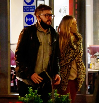 Laura Whitmore - Enjoy the easing of restrictions by going out for a meal with her boyfriend Iain Stirling  in London, December 5, 2020