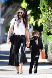 Jordana Brewster - picks up water and an iced coffee drink with her son in Brentwood, California | 01/14/2021