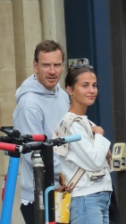 Alicia Vikander & Michael Fassbender - Seen pushing their baby in a pram while out on a stroll in Paris, August 28, 2021