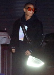 Willow Smith - Puts on lipstick wearing a fashionable long black jacket after dinner with a male friend at Nobu in Malibu, November 8, 2021