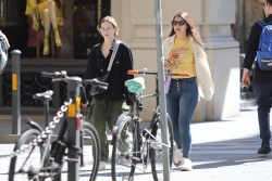 Emma Myers - Goes for a stroll with a friend as she arrives in Florence, May 5, 2023