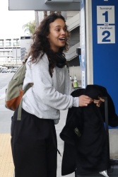 Alisha Boe - Is all smiles while catching a solo flight out of LAX Airport in Los Angeles, January 13, 2023