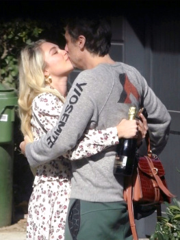 Florence Pugh - shares a kiss with boyfriend Zach Braff as they toast her Oscar nomination with a bottle of champagne in London, January 13, 2020