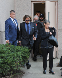 Johnny Depp - And his team are pictured leaving his hotel and heading to his trial against his ex, Amber Heard in Virginia, April 14, 2022