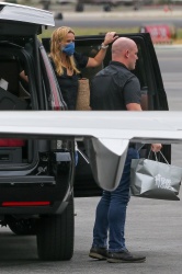 Reese Witherspoon - Pictured boarding a private jet with her daughter Ava Elizabeth Phillippe at Van Nuys Airport, August 22, 2021