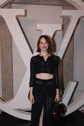 Emma Stone - Attends the photocall of the Louis Vuitton Cruise Show 2024 at Isola Bella on May 24, 2023 in Stresa, Italy.