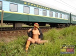 Bella flashes tits and cunt as a train drives by  DirtyPublicNudity 