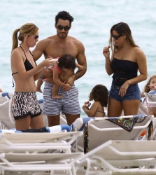 Aaron Diaz - enjoy a day on the beach with their daughters Erin and Regnina in Miami, Florida on January 31, 2016