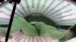 Czechav Blonde masturbating in a solarium