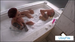 Sexy MILF duo takes bubble bath