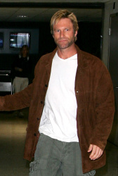 Aaron Eckhart - LAX Airport in Los Angeles - March 18, 2006