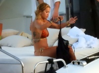 Rita Ora - seen in a tiger print bikini whilst on a yacht in Corfu, Greece | 08/17/2020