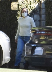 Kristen Bell - stepped outside her home to receive a deliverly in Los Feliz, California | 12/19/2020