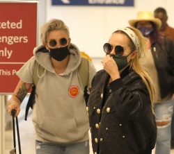 Taryn Manning - Arrives at LAX airport with her fiancée Anne Cline in Los Angeles, August 12, 2021