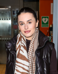 Amber Davies - Looks chic wearing a winter scarf and body warmer pictured at the BBC studios in London, January 16, 2023