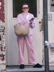 Maisie Williams - Catches a smoke before stepping out in New York City - April 25, 2024